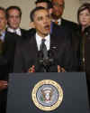 President Barack Obama speaks on the auto industry in the Grand Foyer of the White House on April 30, 2009.