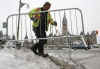 Barricades and locks surround Parliament Hill but Canadians with a message post banners on lamp posts and bridges.