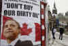 Barricades and locks surround Parliament Hill but Canadians with a message post banners on lamp posts and bridges.